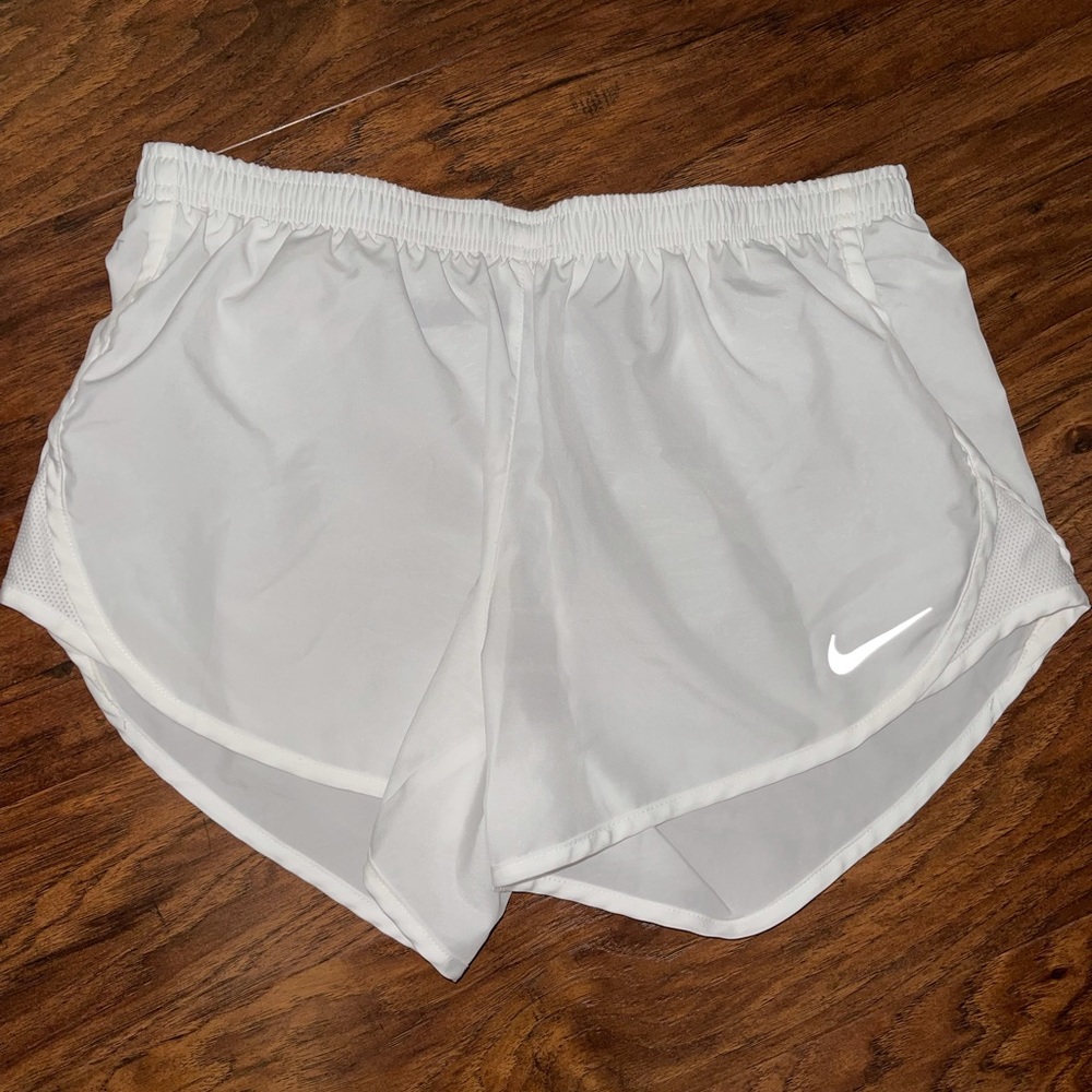 White Nike running shorts